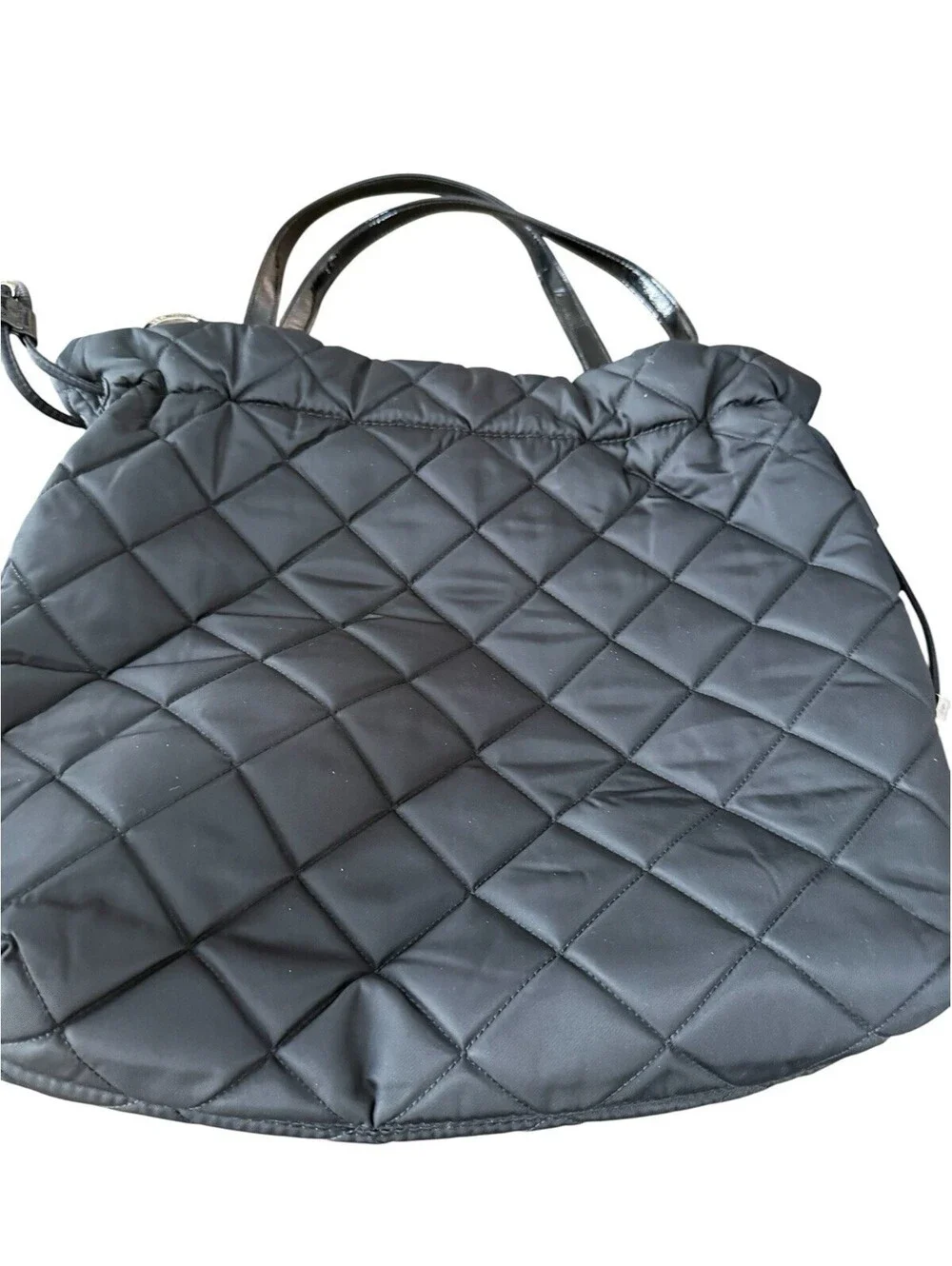 Michael Kors measures 15”